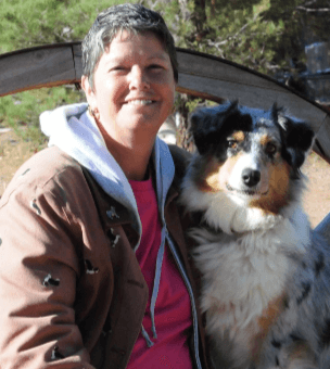 Laura-De-La-Cruz dog trainer, herding dog judge, author with her dog Emee