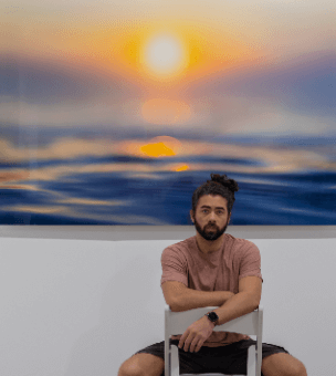 Jason Mason, contemporary photographer infront of sunset photo