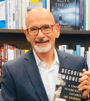 Richard-Lettieri with book, Decoding Madness